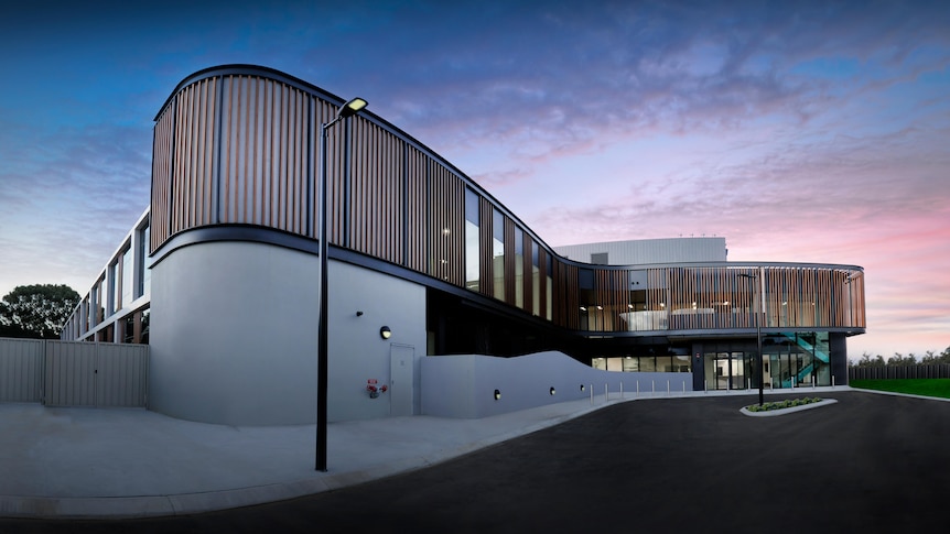 An exterior shot of a large medical facility.