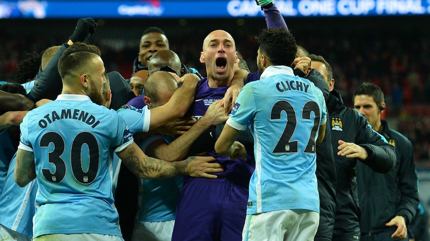 Willy Cabellero celebrates after Man City wins League Cup