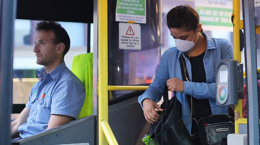 A woman on a bus