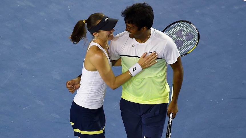 Another title ... Martina Hingis (L) and Leander Paes celebrate their win