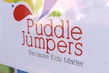The words Puddle Jumpers and colourful stylised splash marks on a white background