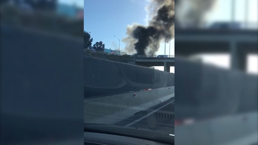 Footage shows smoke rising from a retail outlet centre near Melbourne's Essendon Airport