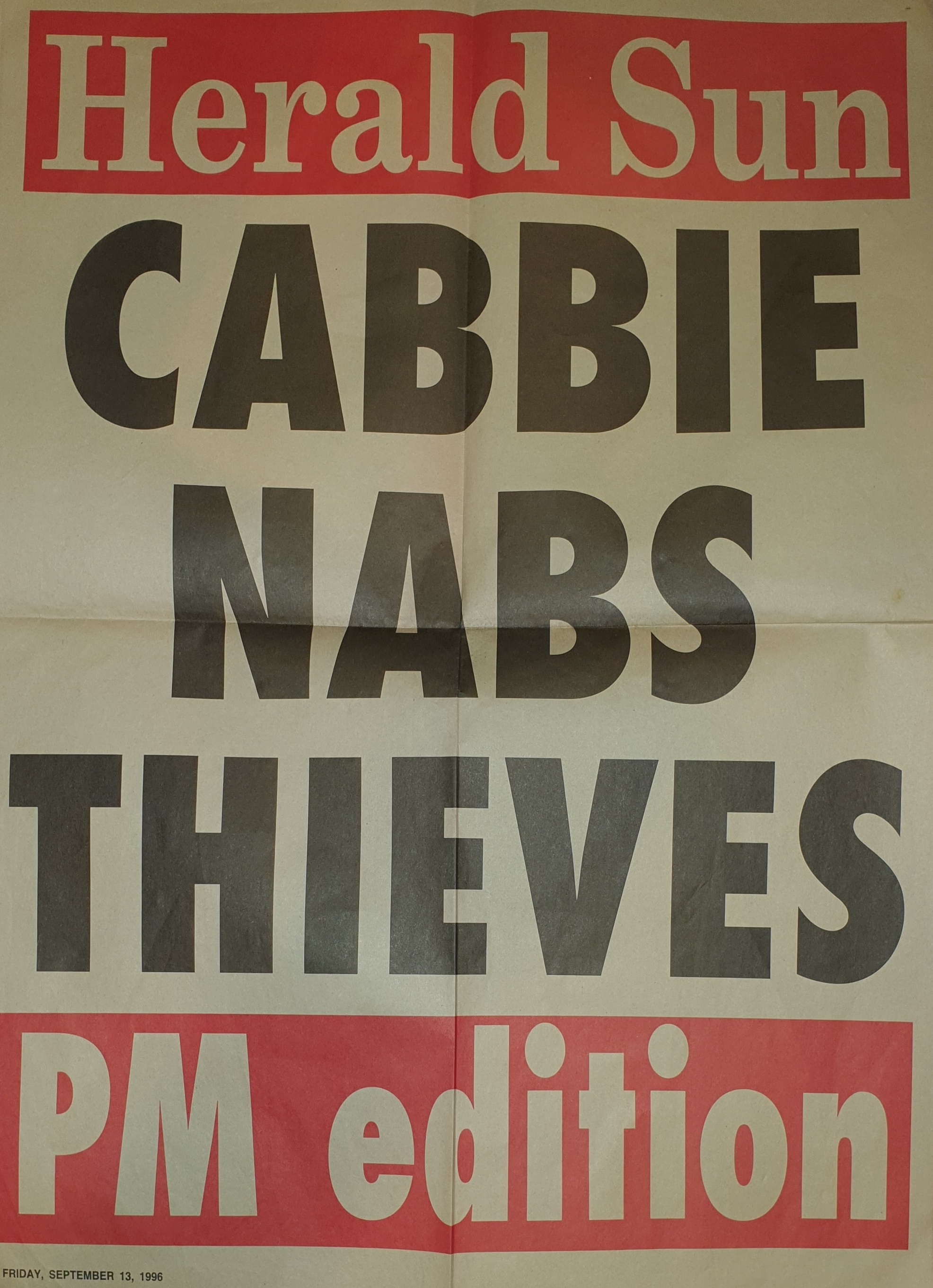 A Herald Sun newspaper poster which reads 'CABBIE NABS THIEVES'.