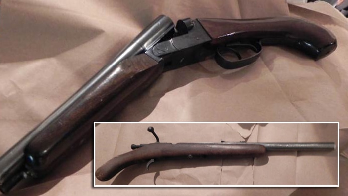 The sawn off double barrel shotgun and a sawn off .22 rifle (inset) seized by police.