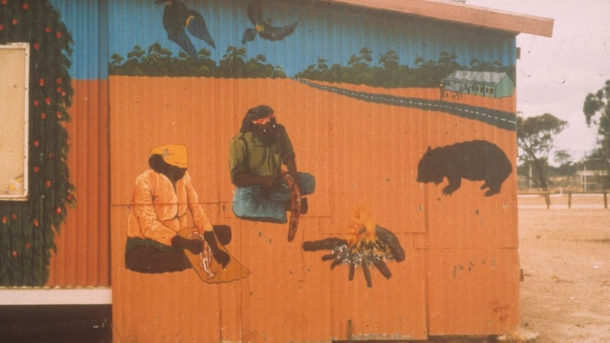 A mural showing the highway, outback, Indigenous people and wildlife at Yalata.