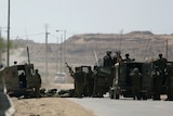 Israel troops battle with Palestinian militants near the Kissufim crossing.