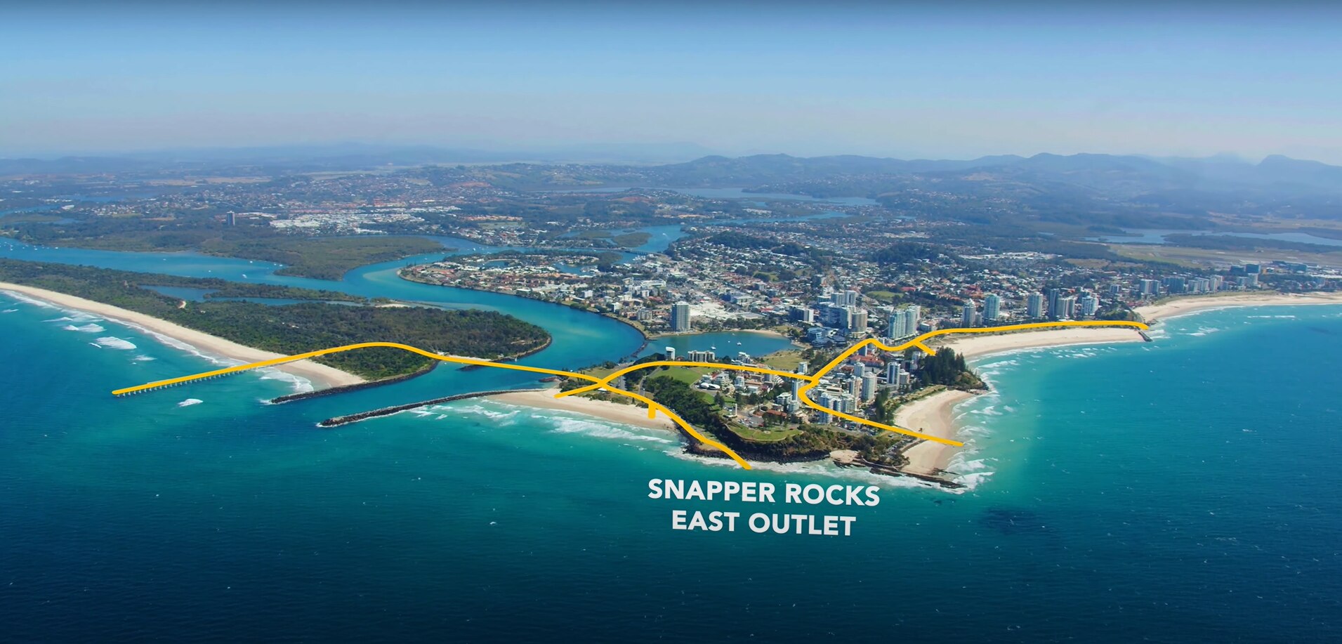 an aerial shot of Tweed Heads and Coolangatta with yellow lines representing the path of the underground sand pipeline network