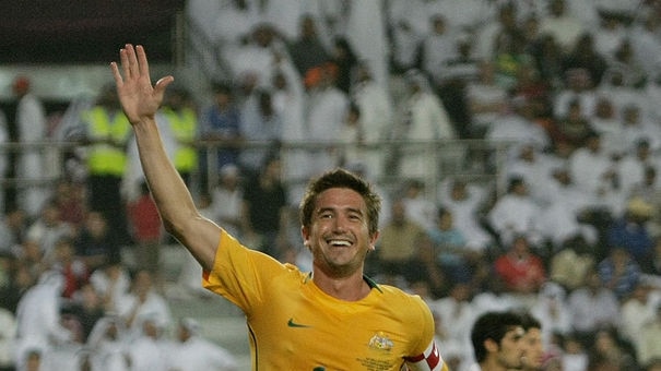 Harry Kewell celebrates after scoring against Qatar