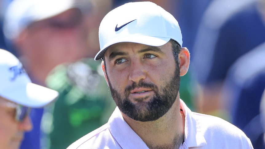 Scottie Scheffler looks to his right during a practice round ahead of The Players Championship.