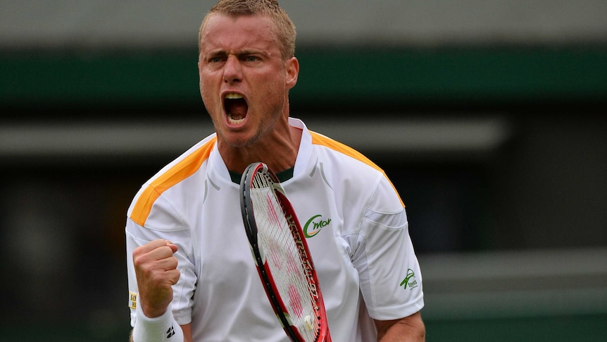 Hewitt triumphs in Wimbledon first round