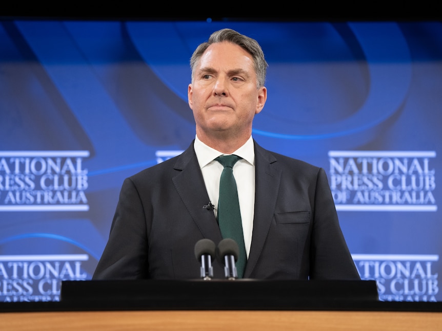 Richard Marles speaking at a podium in the National press Club