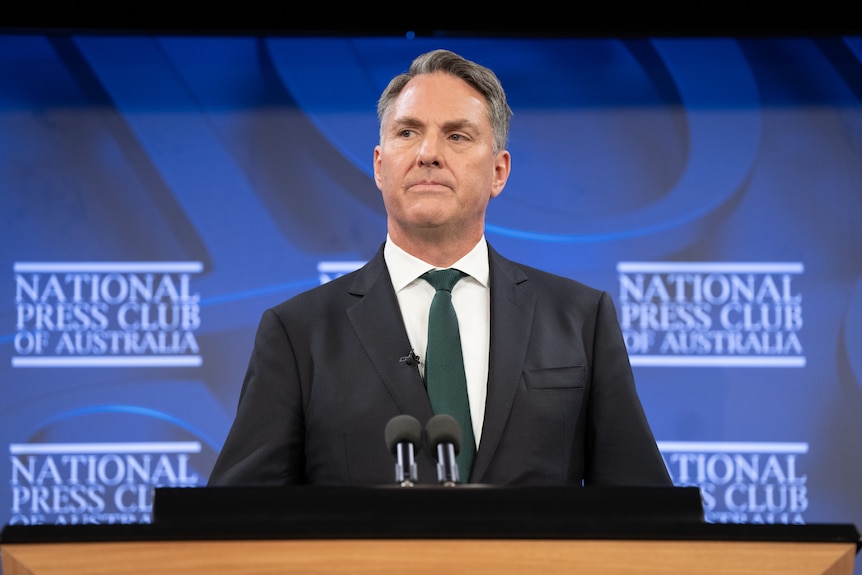 Richard Marles speaking at a podium in the National press Club