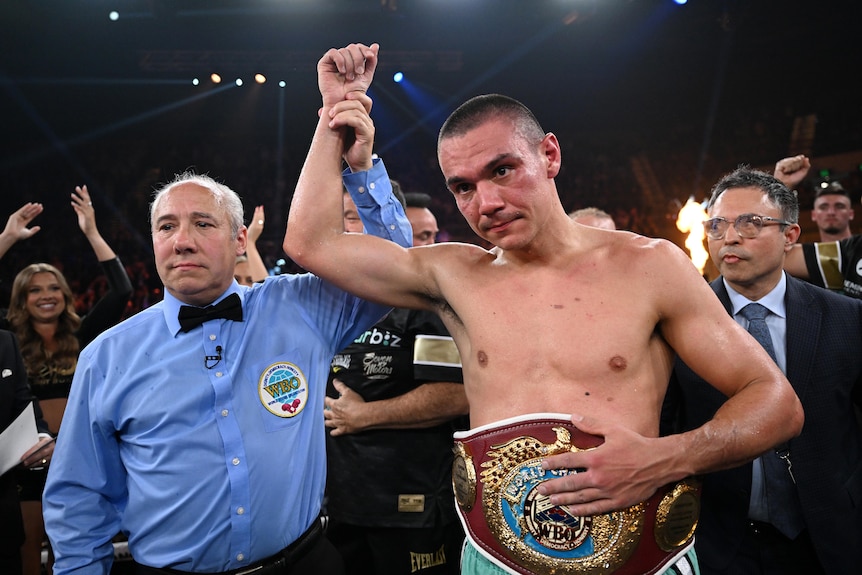 The referee raises Tim Tszyu's hand