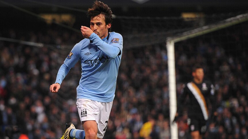 David Silva celebrates his second goal for Manchester City against Fulham.