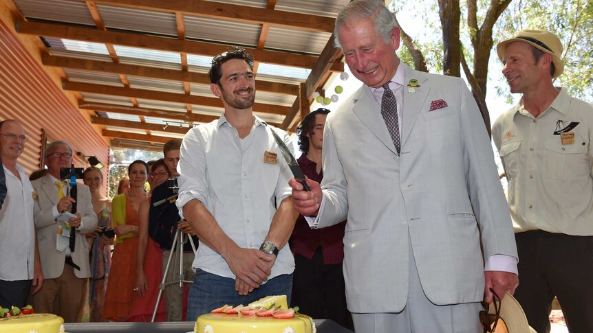 Prince Charles about to cut a birthday cake at Oranje Tractor Wines in Albany