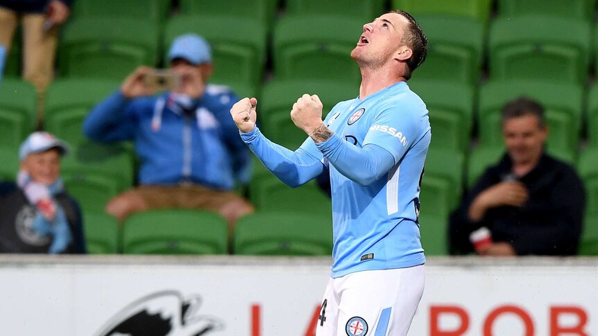 Ross McCormack pumps his first and looks to the sky after scoring a goal for Melbourne City.