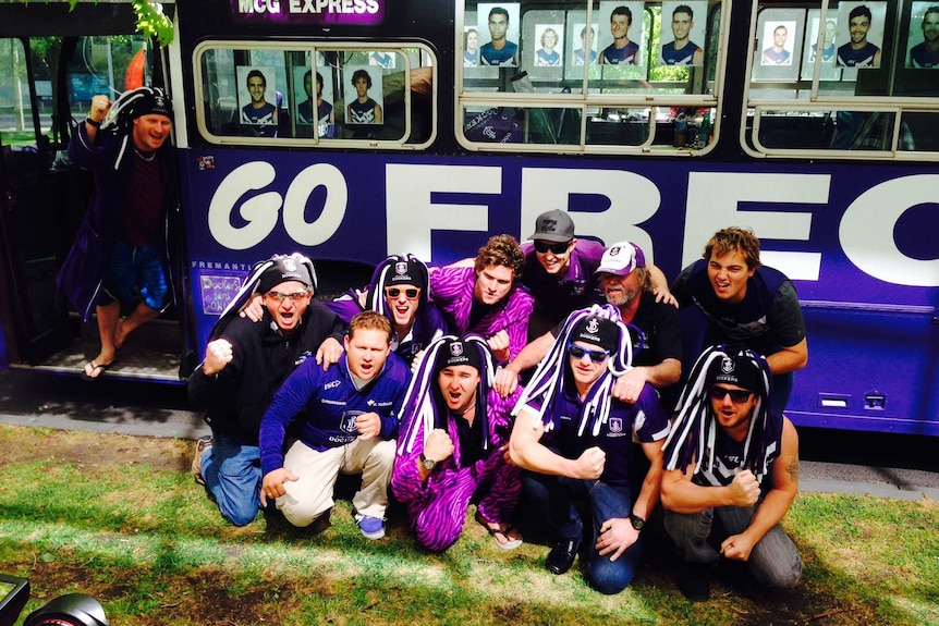 Fremantle fans outside bus that travelled from Fremantle to Melbourne.