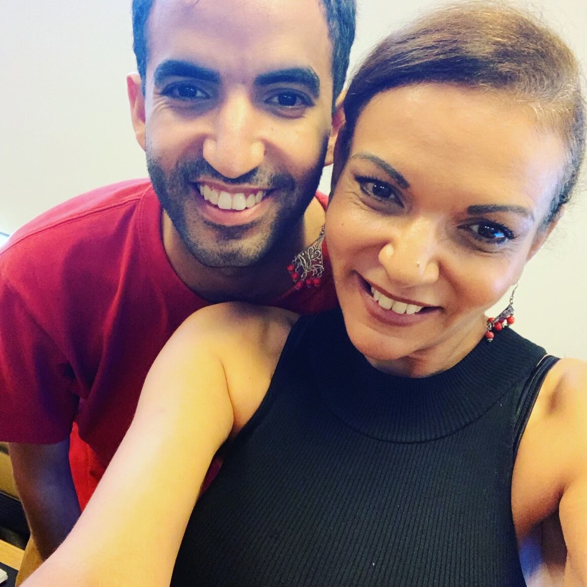 Anne Aly smiling in a selfie with her adult son Adam.