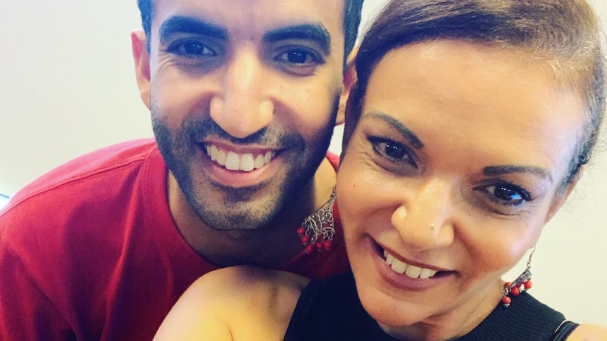 Anne Aly smiling in a selfie with her adult son Adam.
