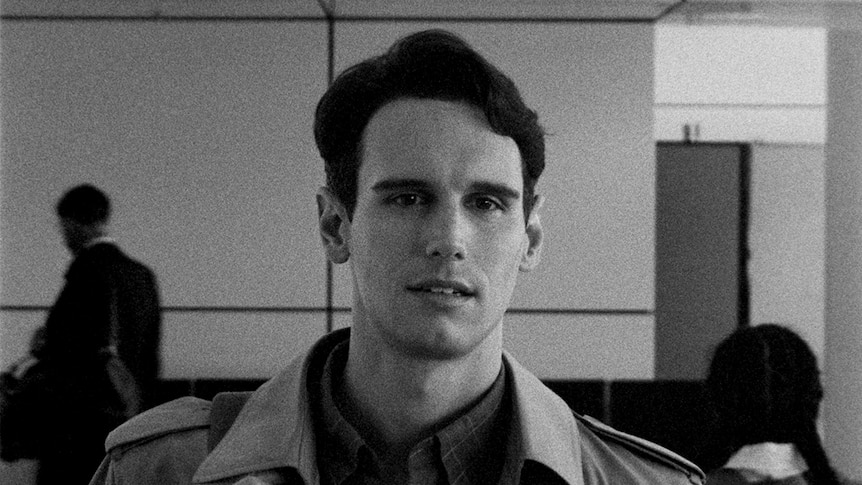 Black and white close-up still of Cory Michael Smith in 2018 film 1985.