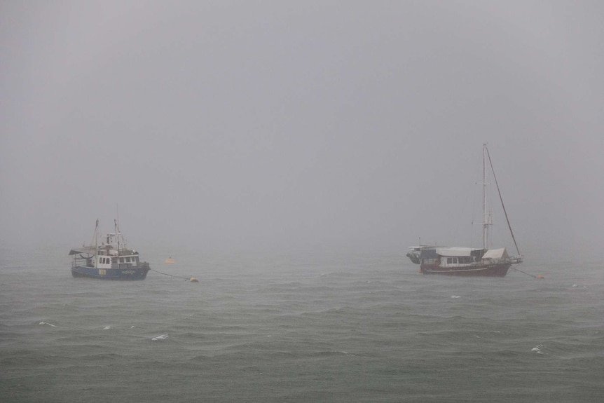 Boats in the heavy rain on Darwin Harbour on Christmas Eve, 2015.