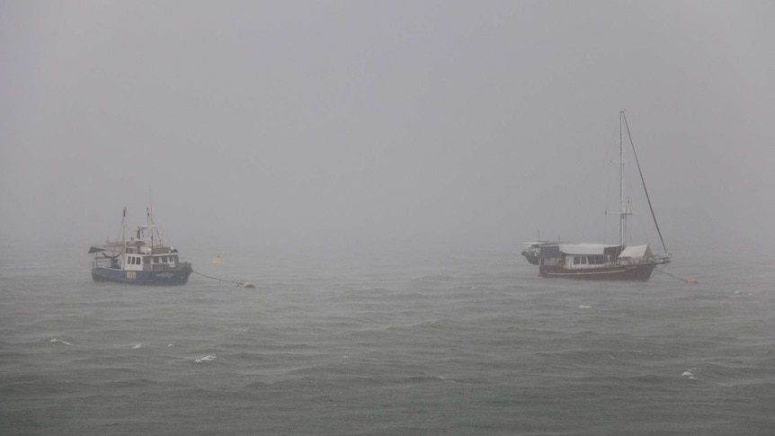 Boats in the heavy rain on Darwin Harbour on Christmas Eve, 2015.