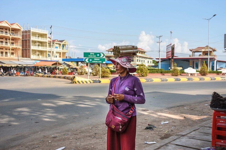 Woman in purple at intersection