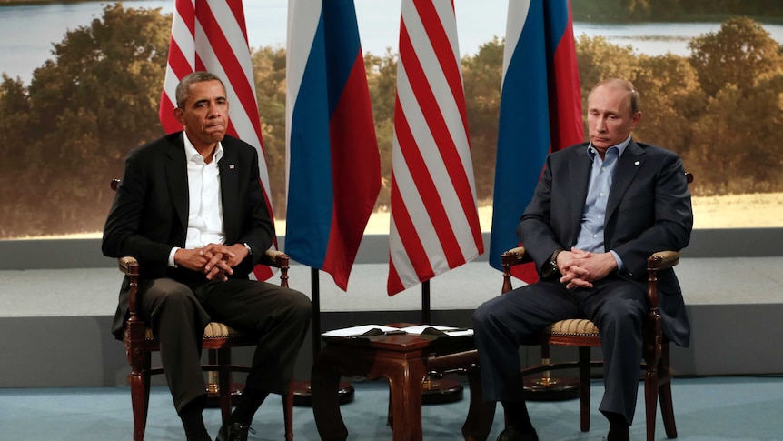 Mr Obama and Russian President Vladimir Putin not speaking during media event