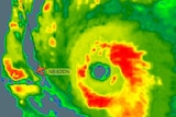 A screenshot of a flight radar shows a flight path against the satellite image of Hurricane Irma.