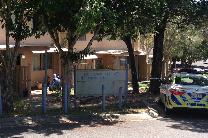 Police at a unit in Wynnum West where a man was found dead in February 2018.