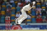 West Indies Jerome Taylor mid bowl to Australia