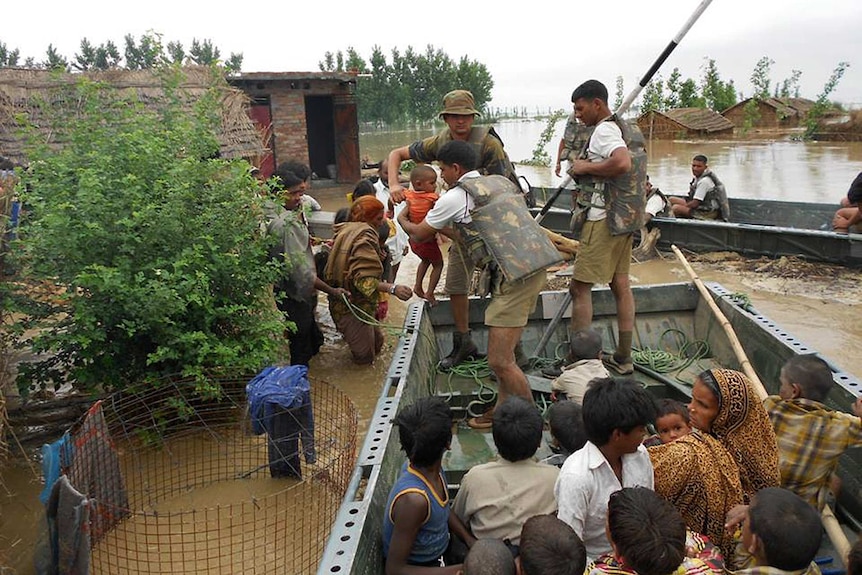 Indian troops assist people stranded by floods