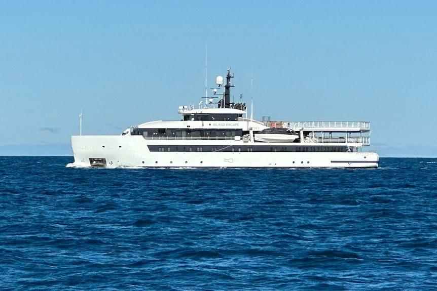 A white luxury boat on the ocean