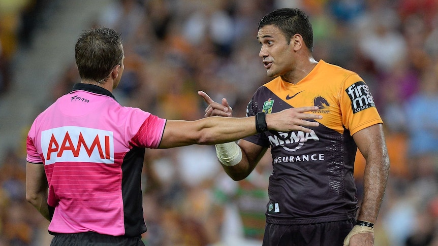 Dubious calls ... Justin Hodges questions referee Gavin Badger during the Rabbitohs encounter