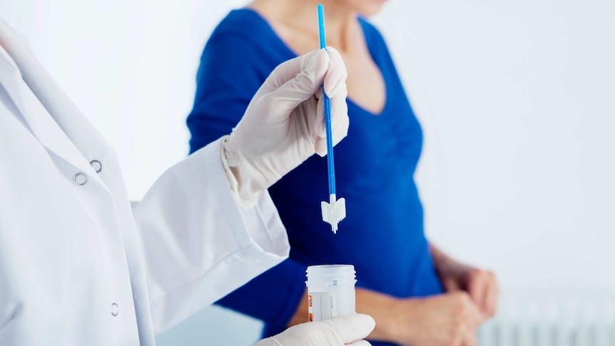 Doctor doing a cervical screening test