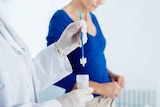 Doctor doing a cervical screening test
