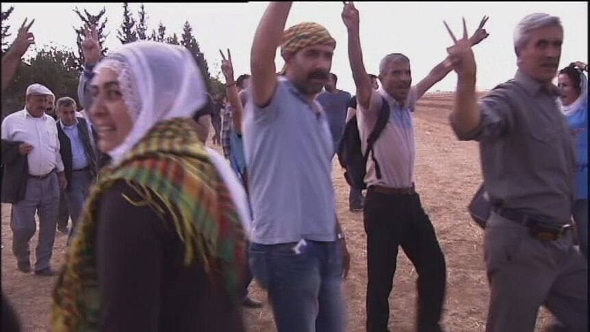 Kurdish Syrians warn of massacre if IS captures town