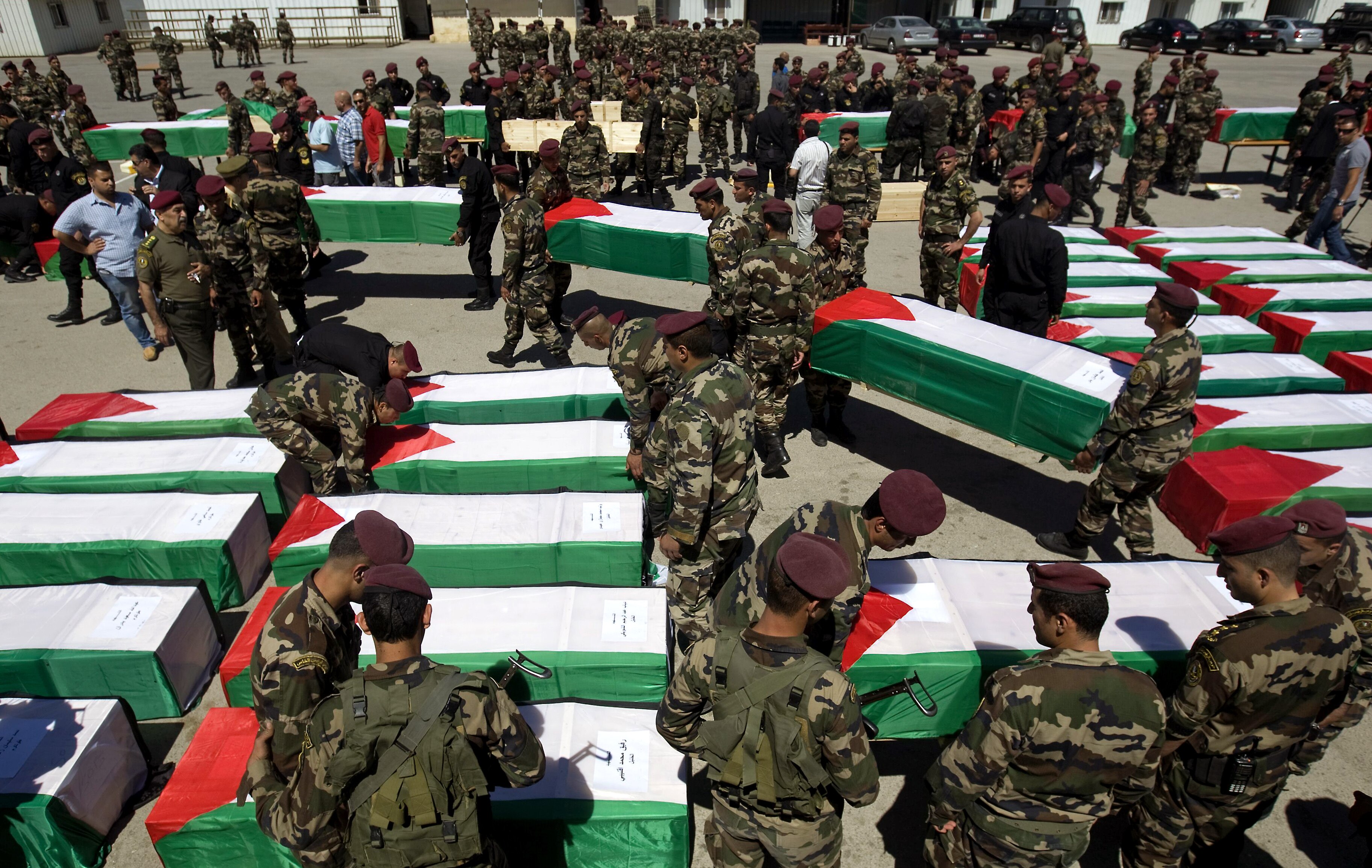 Israel hands over Palestinian militants' remains - ABC News