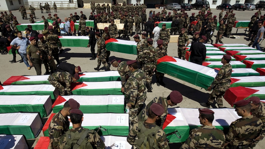 Palestinian militants' remains sent home