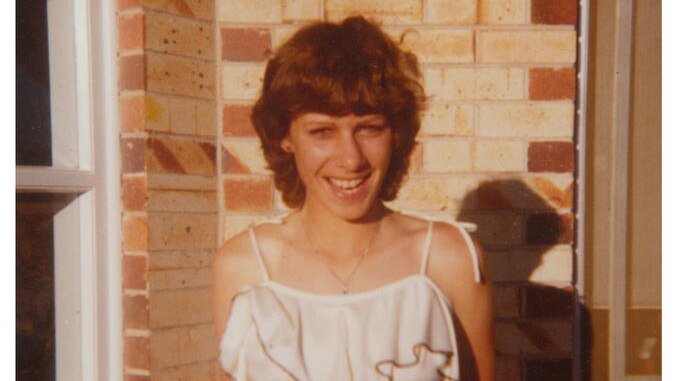 Indigenous poet Ali Cobby Eckermann, aged 17, smiles as she poses for a photo against a brick wall