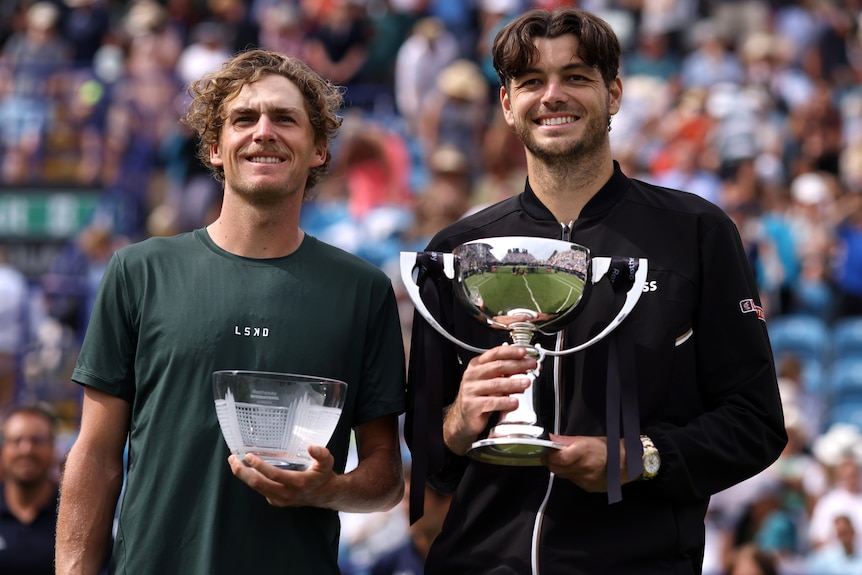 Max Purcell and Taylor Fritz with their Eastbourne International trophies.
