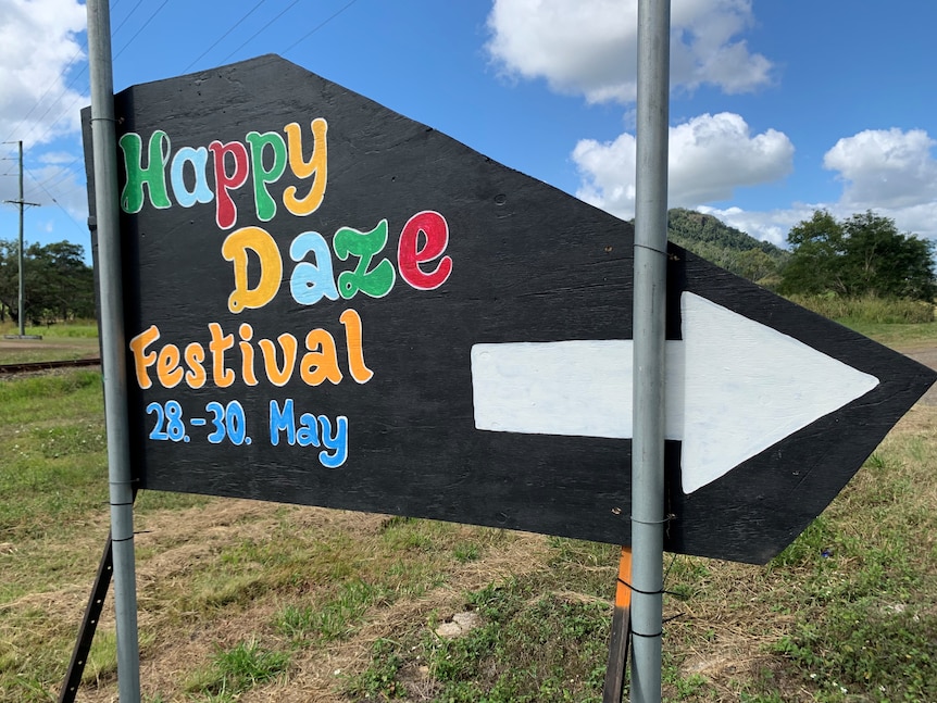 A sign showing the direction to the Happy Daze Music Festival near Mackay