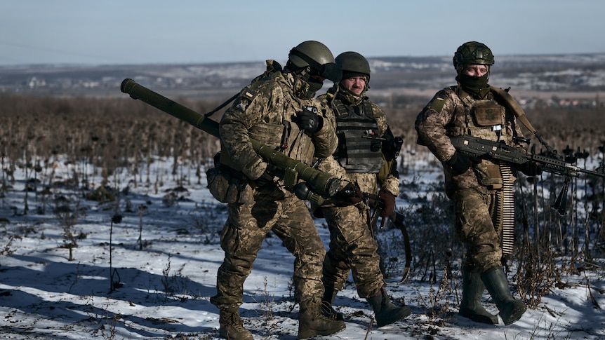 Ukrainian soldiers on their positions in the frontline near Soledar.