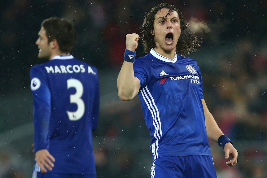 Chelsea's David Luiz celebrates scoring a goal against Liverpool at Anfield.