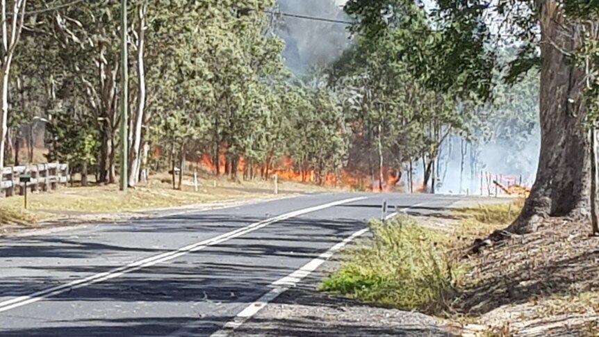 Flames near a road.