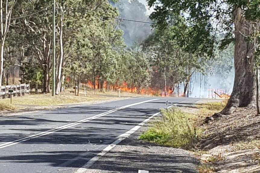 Flames near a road.