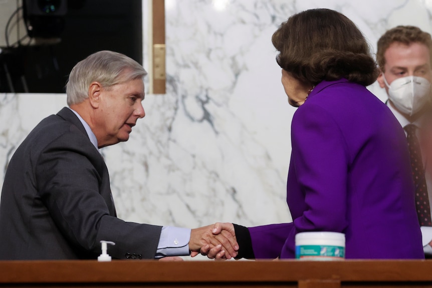 Lindsey Graham and Dianne Feinstein shaking hands