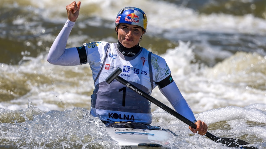 Jessica Fox celebrates winning the C1 slalom gold at the World Cup event in Kraków, Poland.