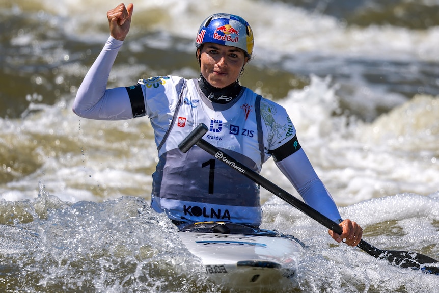 Jessica Fox celebrates winning the C1 slalom gold at the World Cup event in Kraków, Poland.
