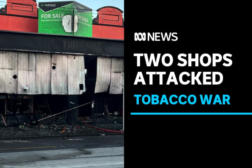 Two shops attached, tobacco war: A dark image at night of a burnout shop. 